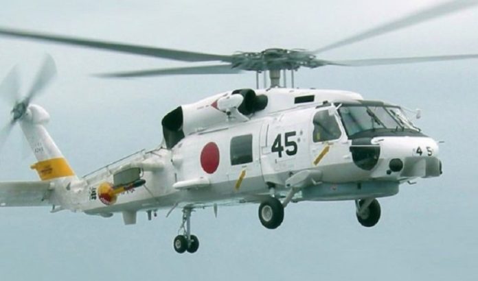 Two Japan navy helicopters crash