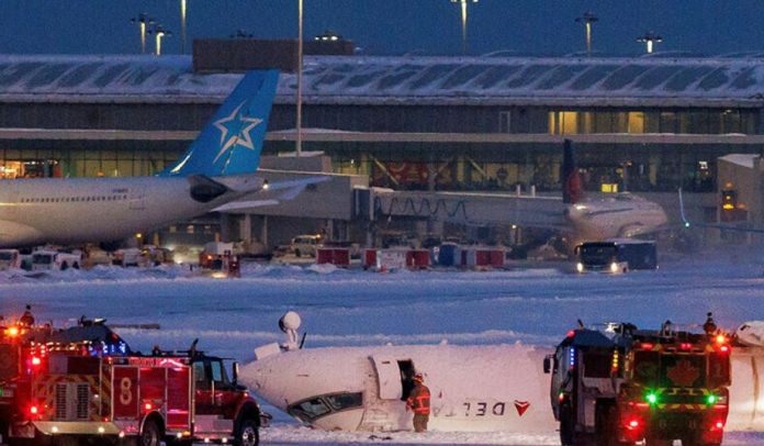 Delta plane flips upside down on landing at Toronto airport