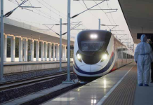 Train hits China railway workers, killing 11