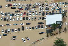 Race to get aid to Asia flood survivors as toll nears 1,200