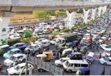Attock road blocked in protest against new vehicle ordinance