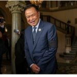 Thai PM agrees coalition with Thaksin-backed party Thai PM agrees coalition with Thaksin-backed party