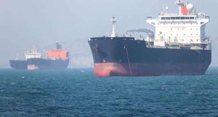 0000 US sinks Iranian small boats, shoots down missiles, drones as reopening of Strait underway