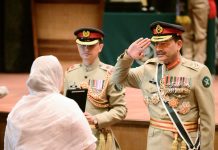 Field Marshal confers  military awards
