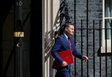 Senior UK minister resigns, calls for a leadership contest to oust PM Starmer