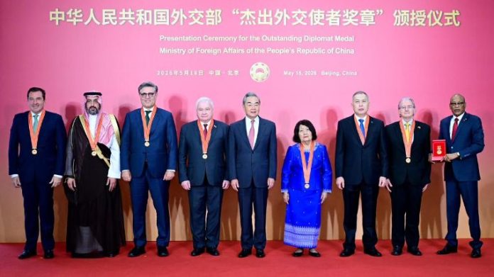DNA 18-14 China awards outstanding diplomat medal to Khalil Hashmi