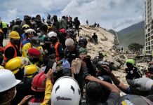 Father, son rescued after 4 days in Venezuela quake rubble Father, son rescued after 4 days in Venezuela quake rubble