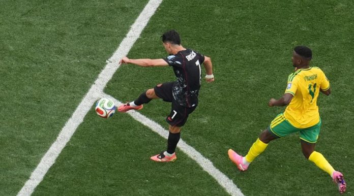 111 Canada reach World Cup last 16 as late strike sinks South Africa