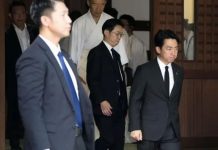 Japan defense minister visits contentious Yasukuni Shrine Japan defense minister visits contentious Yasukuni Shrine