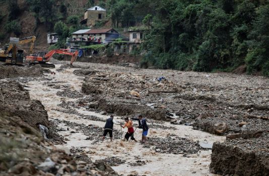 NEWS Rescuers scour Nepal flood debris as death toll crosses 460
