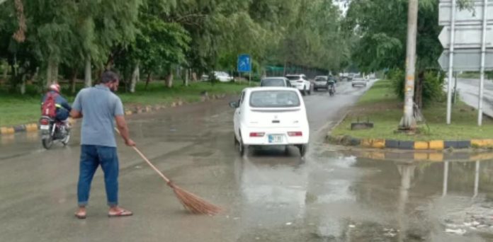 NEWS CDA teams clear fallen trees, drain rainwater after Islamabad downpour