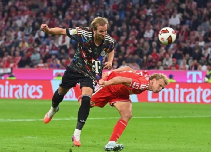 NEWS Kane hits Bundesliga century as Bayern rout Union