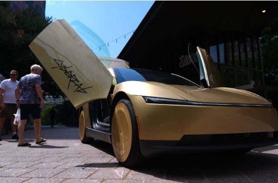 NEWS Musk launches steering-wheel-free taxi service
