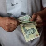 Iran’s currency hits a new record low Iran’s currency hits a new record low